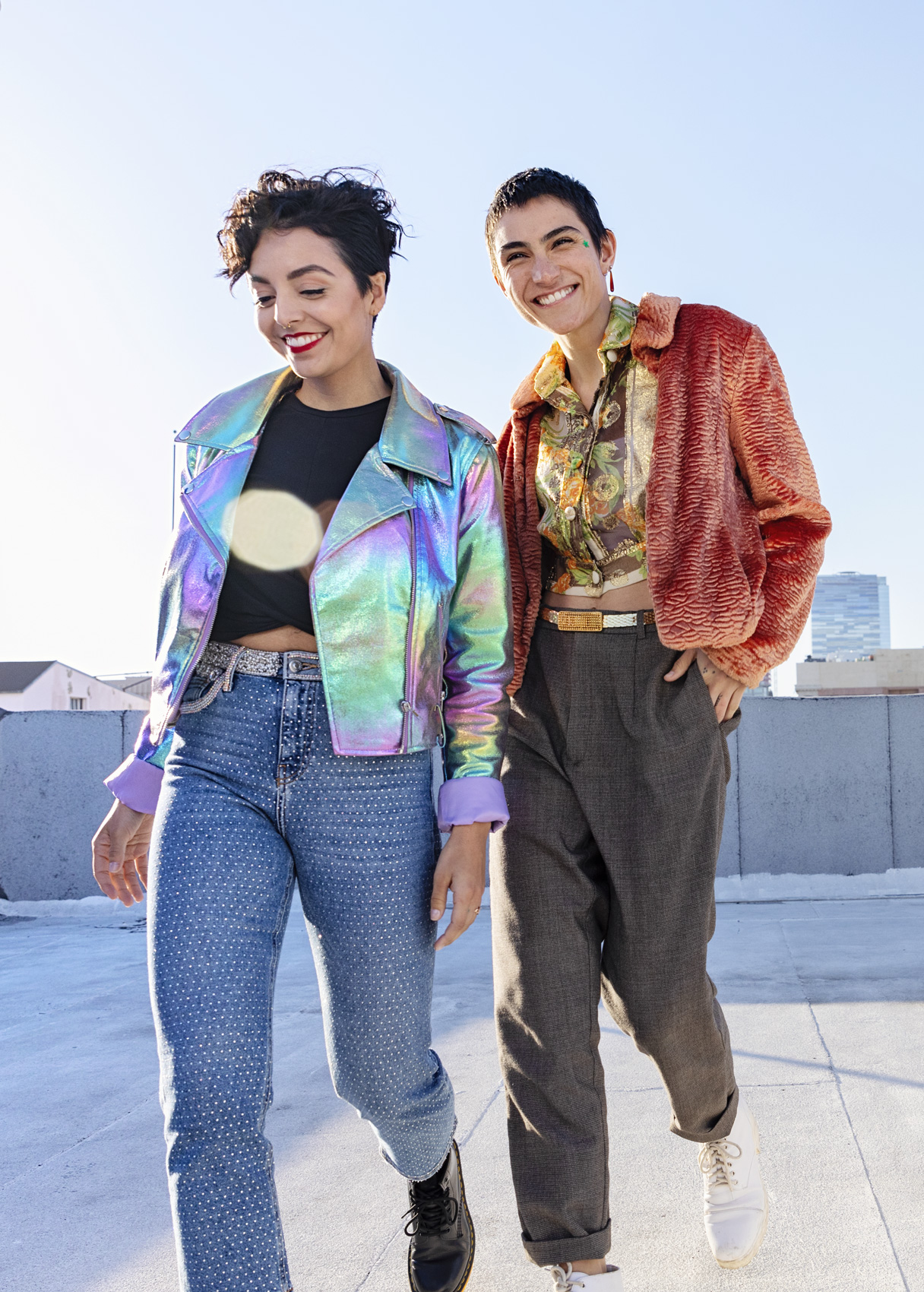 LGBTQ youth walking together on a city roof